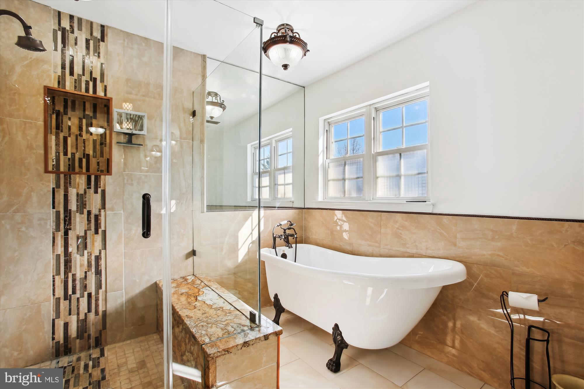 6103 Deer Ridge Trail Springfield, VA 22150 - Photo 15 of 36 a bathroom with a bathtub and shower