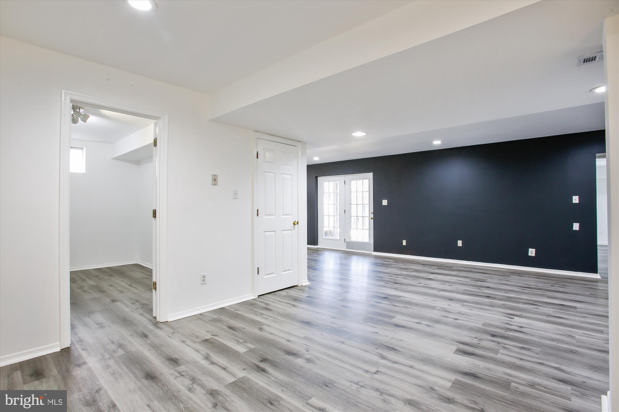 6103 Deer Ridge Trail Springfield, VA 22150 - Photo 17 of 36 a view of a livingroom with wooden floor