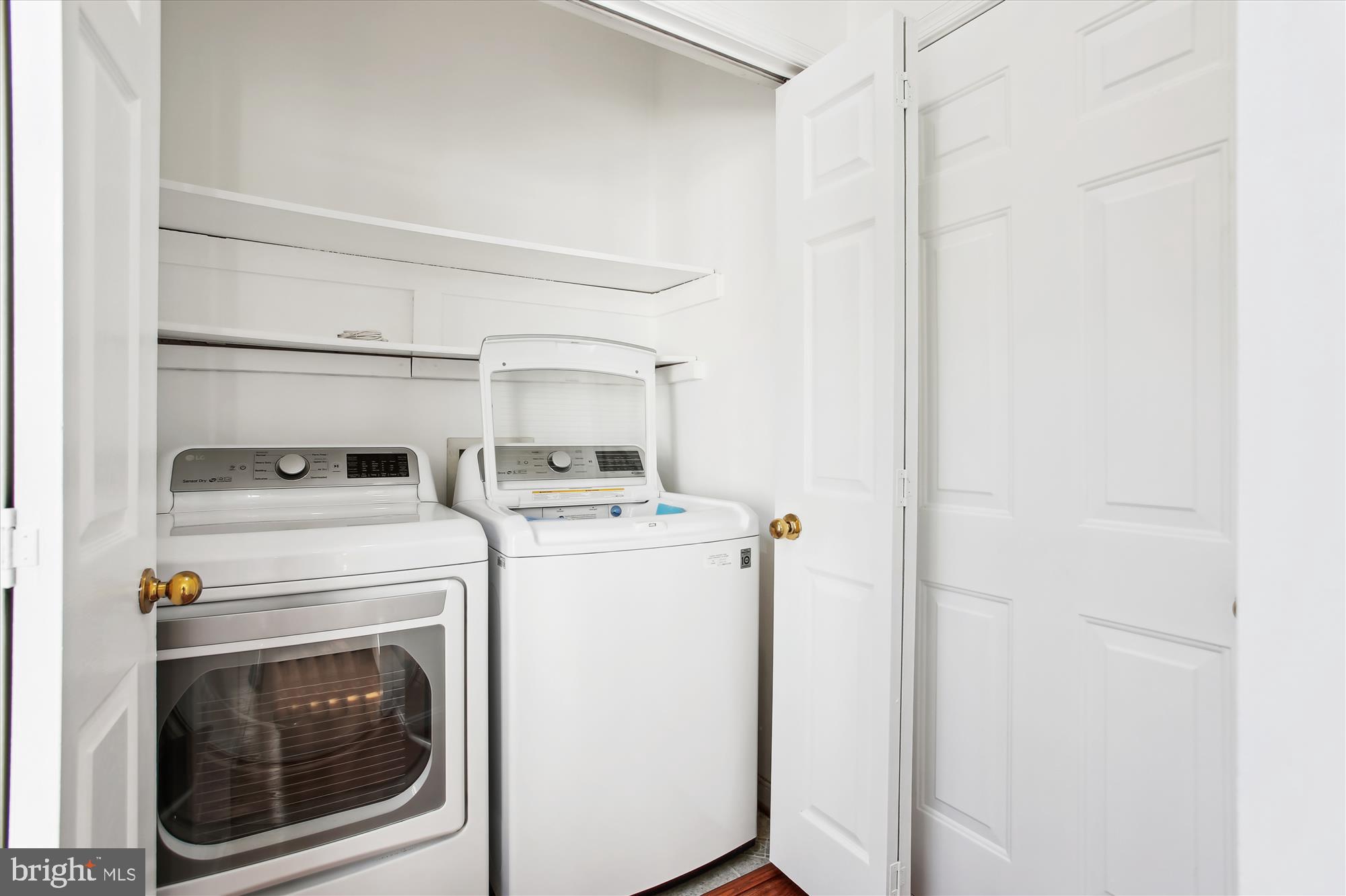 6103 Deer Ridge Trail Springfield, VA 22150 - Photo 21 of 36 a utility room with dryer and washer