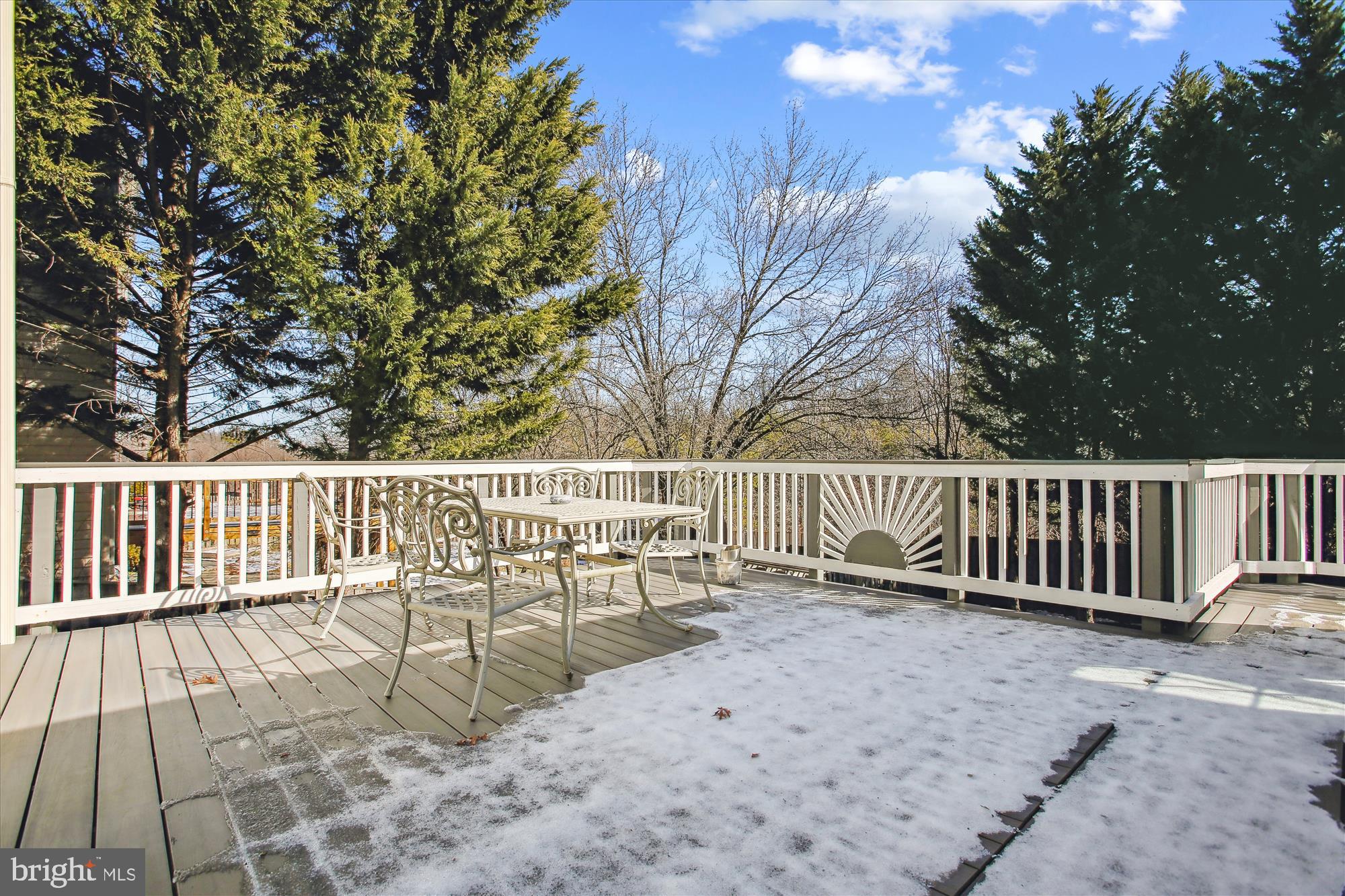 6103 Deer Ridge Trail Springfield, VA 22150 - Photo 24 of 36 a view of deck with a large window and wooden fence