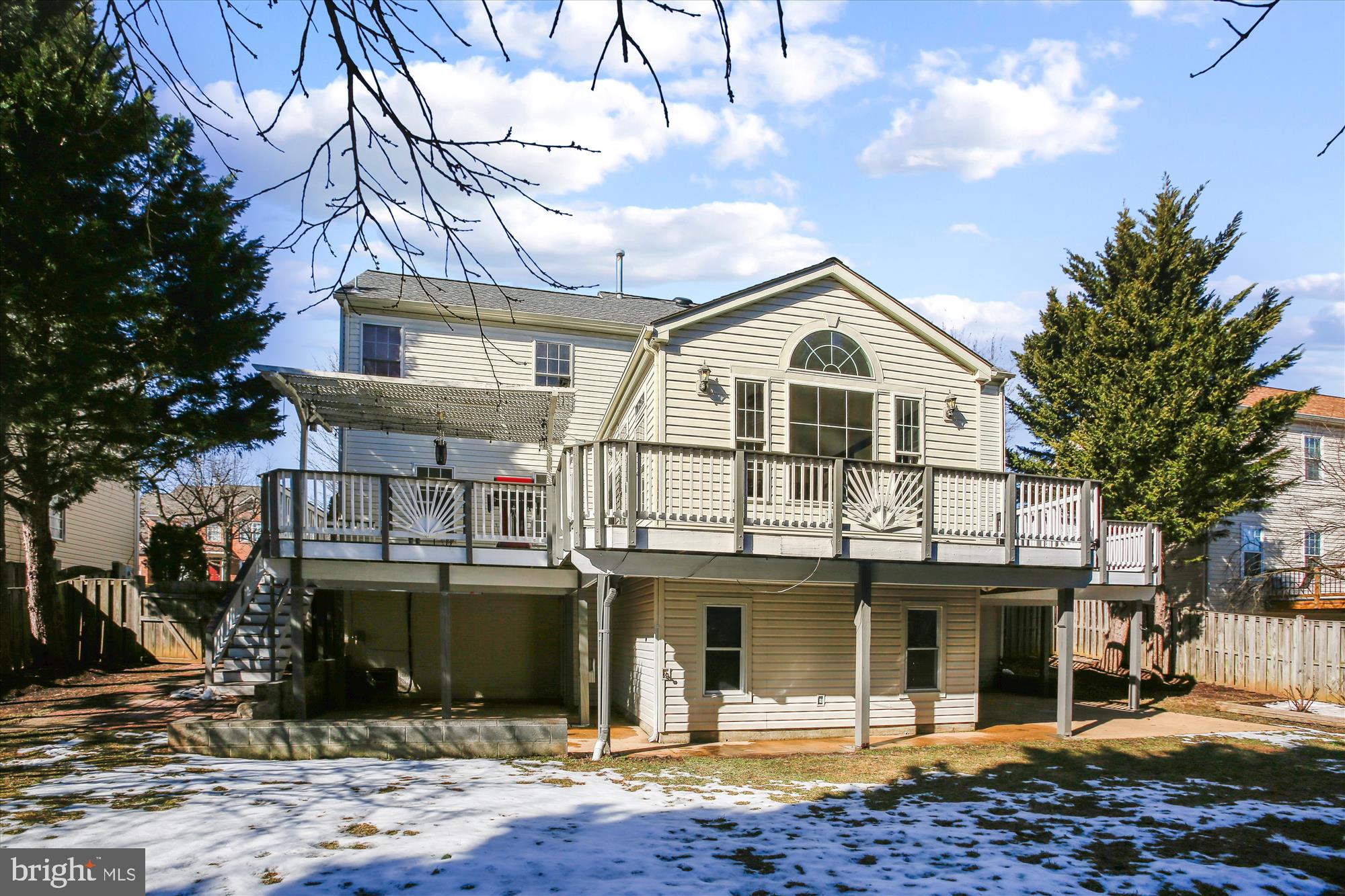 6103 Deer Ridge Trail Springfield, VA 22150 - Photo 26 of 36 a front view of a house with garden