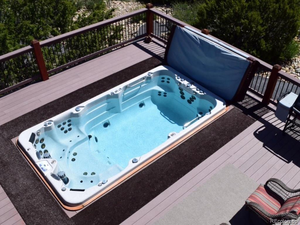 9780 Canyon Point Drive Rye, CO 81069 - Photo 19 of 35 a view of balcony with wooden floor