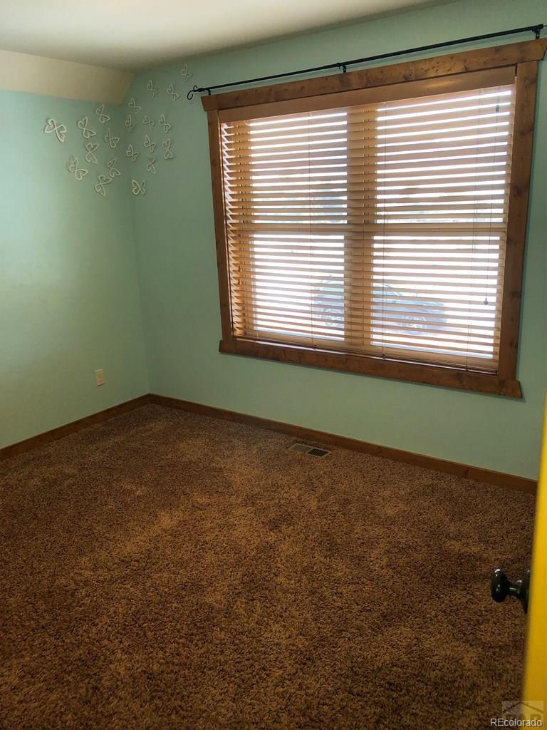 9780 Canyon Point Drive Rye, CO 81069 - Photo 34 of 35 an empty room with a window