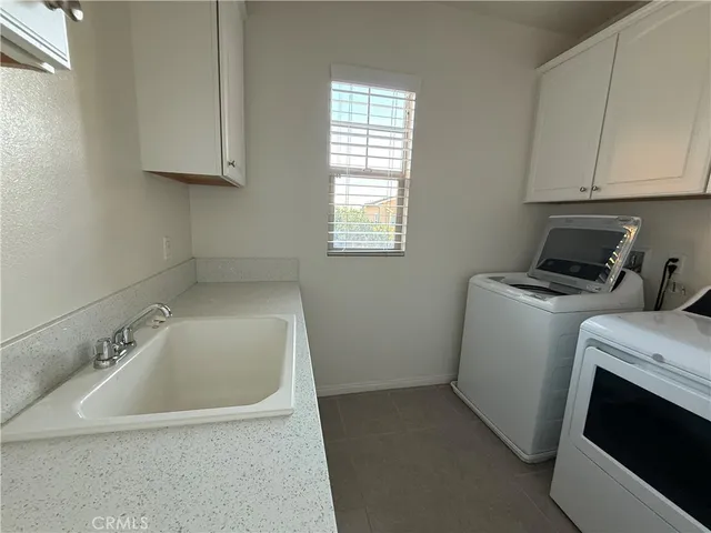 a view of a house with entrance gate