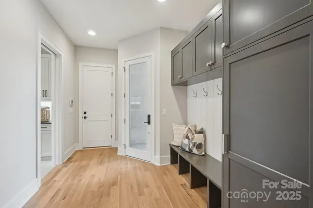 a view of entryway with wooden floor