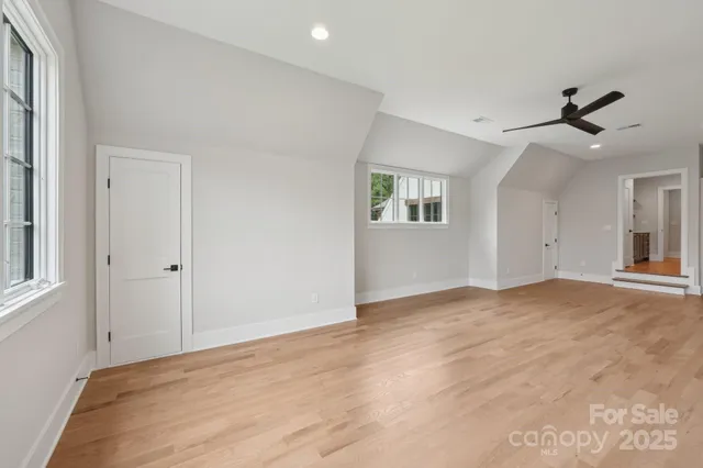 a kitchen with a sink and a refrigerator