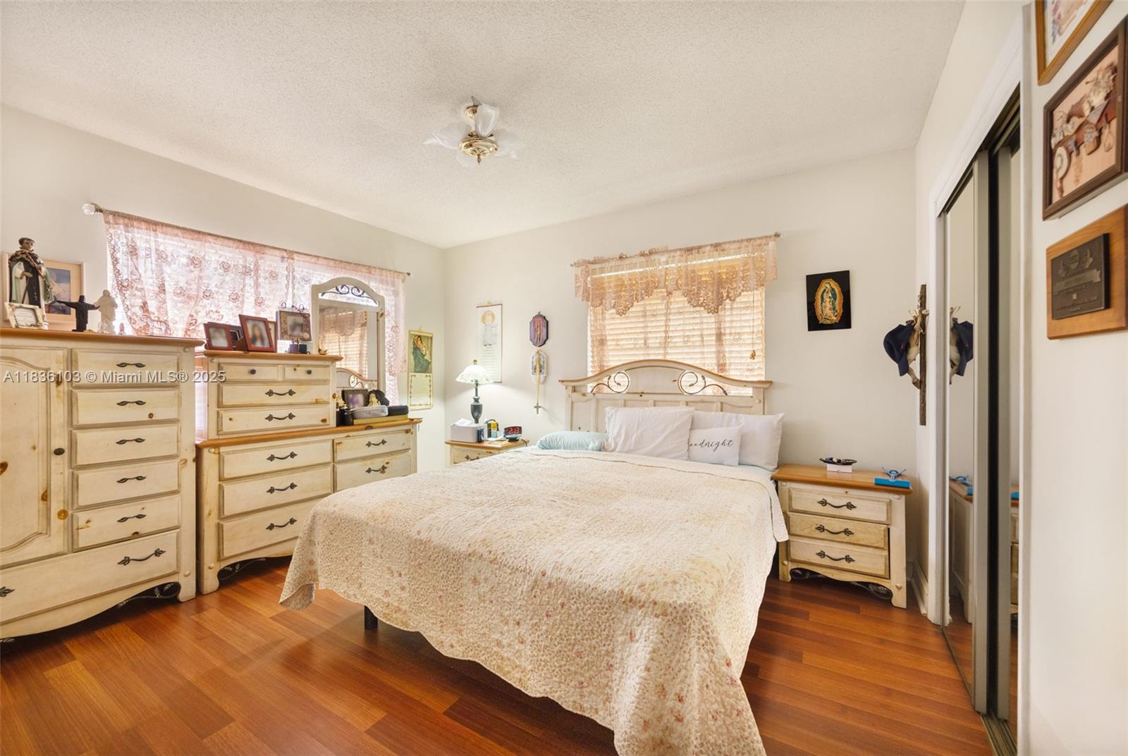 811 Southwest 25th Road Miami, FL 33129 - Photo 17 of 23 a bedroom with a bed and a dresser