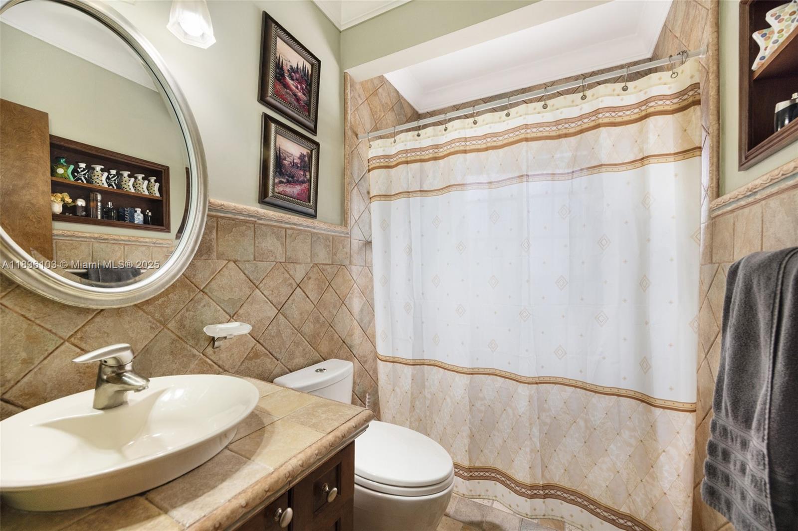 811 Southwest 25th Road Miami, FL 33129 - Photo 19 of 23 a bathroom with a sink toilet and shower