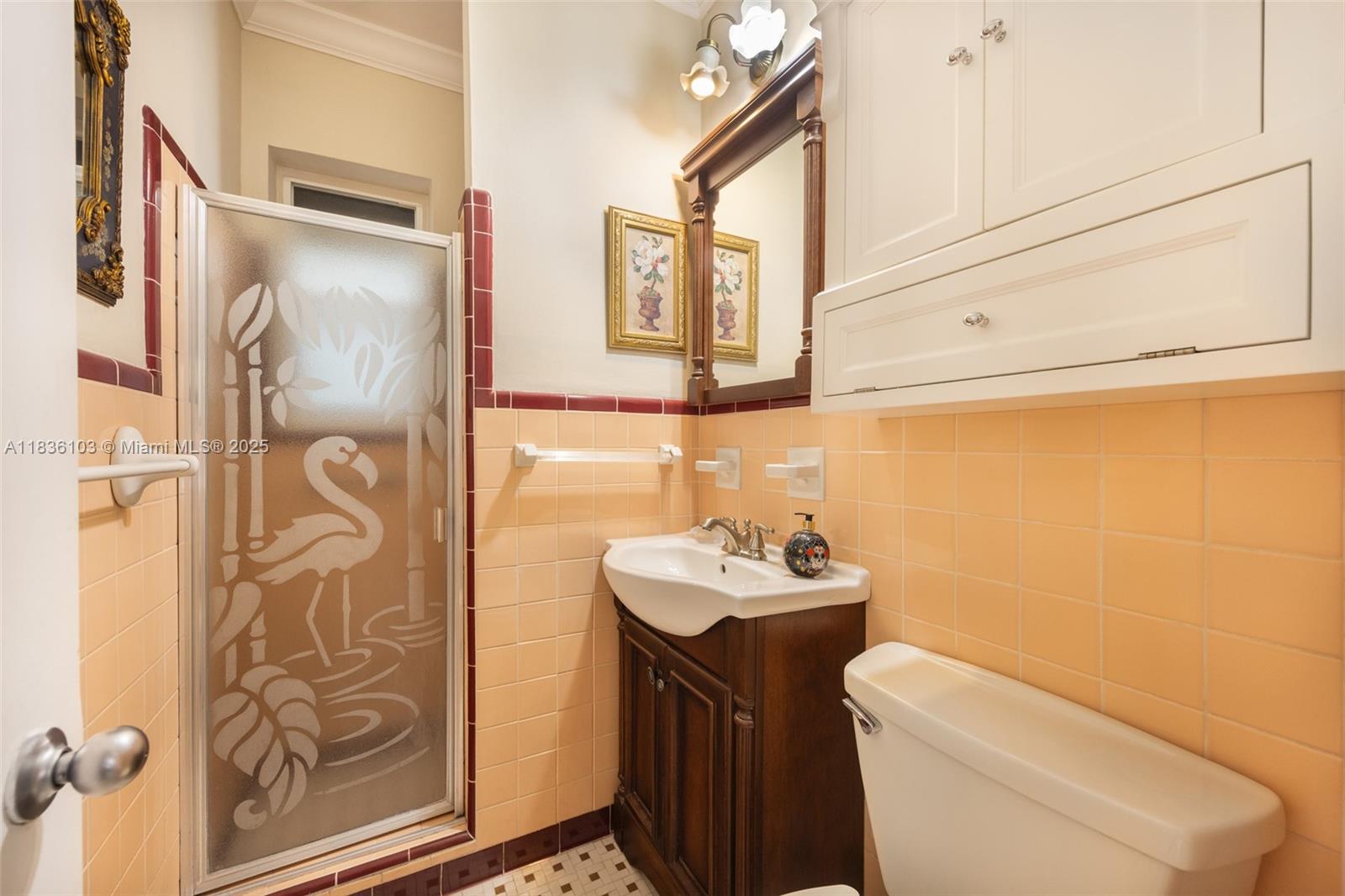 811 Southwest 25th Road Miami, FL 33129 - Photo 20 of 23 a bathroom with a sink toilet and mirror