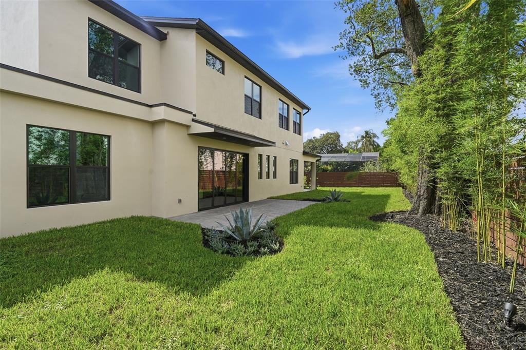 1615 Cole Road Orlando, FL 32803 - Photo 28 of 31 a view of a house with backyard and sitting area
