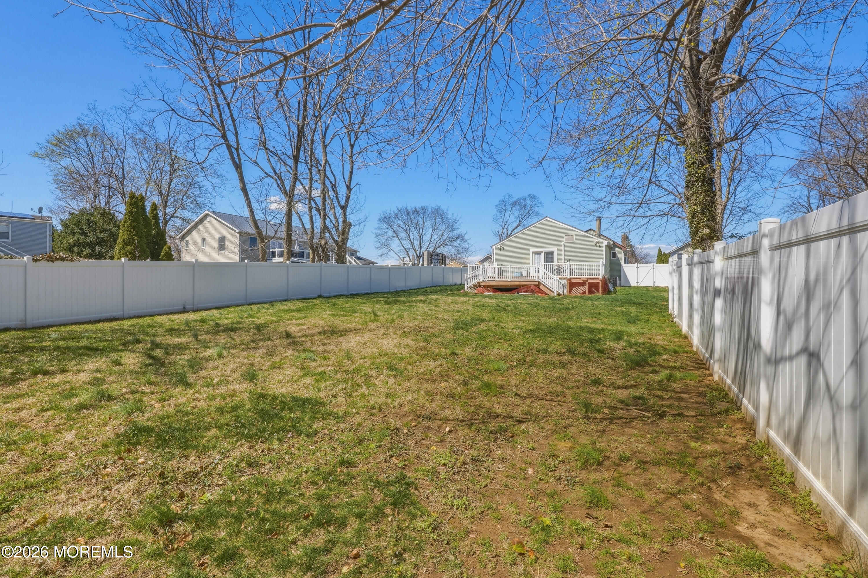578 High Street Long Branch, NJ 07740 - Photo 26 of 37 a view of a backyard with large trees