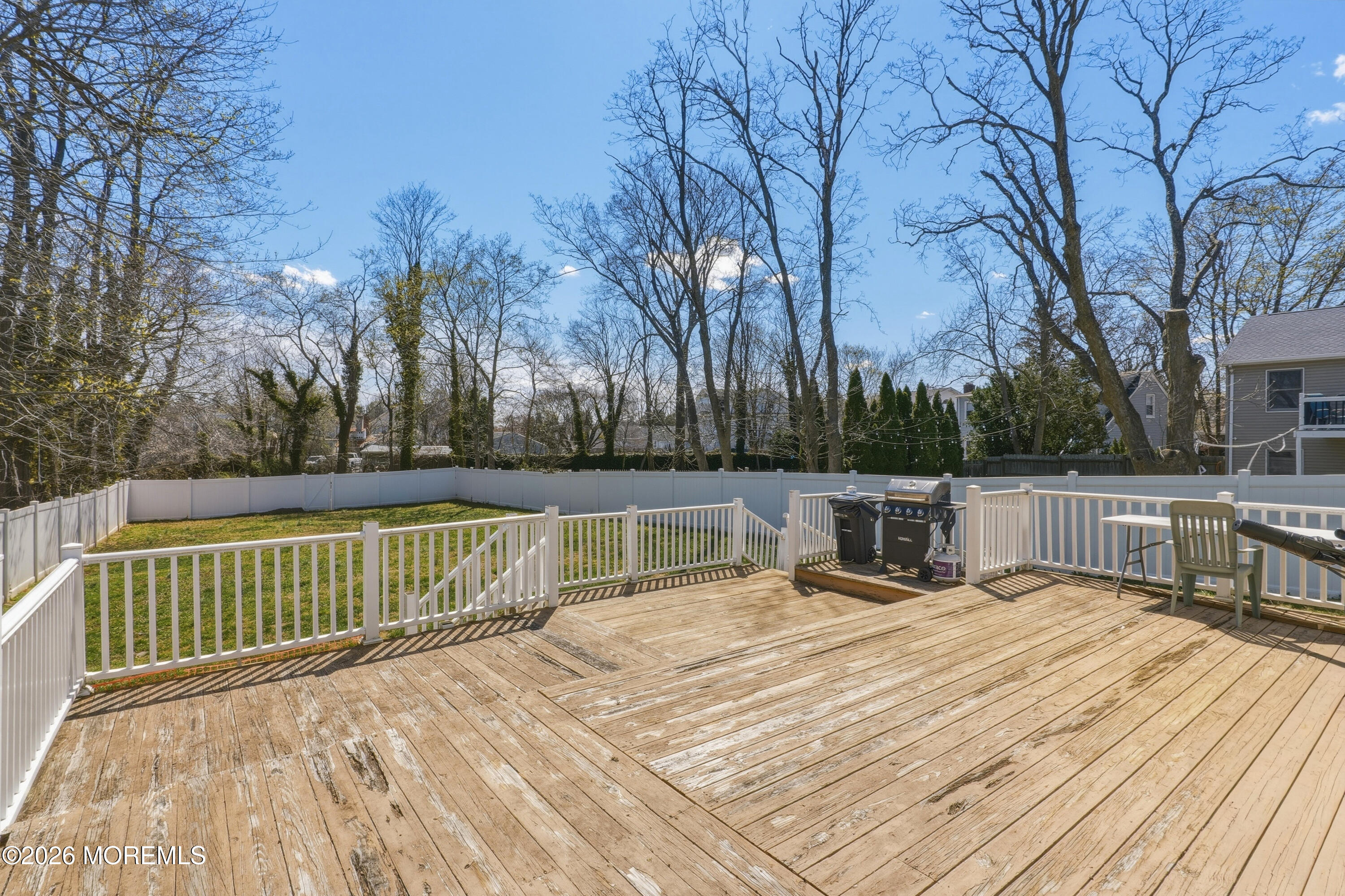 578 High Street Long Branch, NJ 07740 - Photo 27 of 37 a view of a deck with chairs and wooden fence