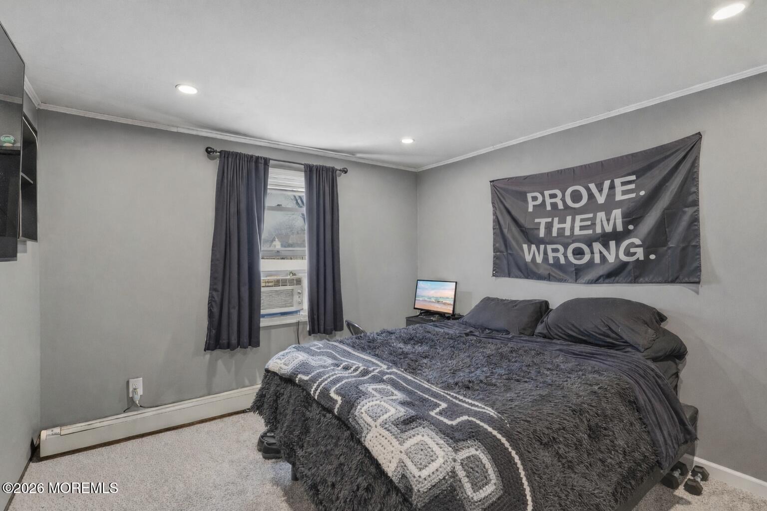 578 High Street Long Branch, NJ 07740 - Photo 34 of 37 a bedroom with a large bed and a window