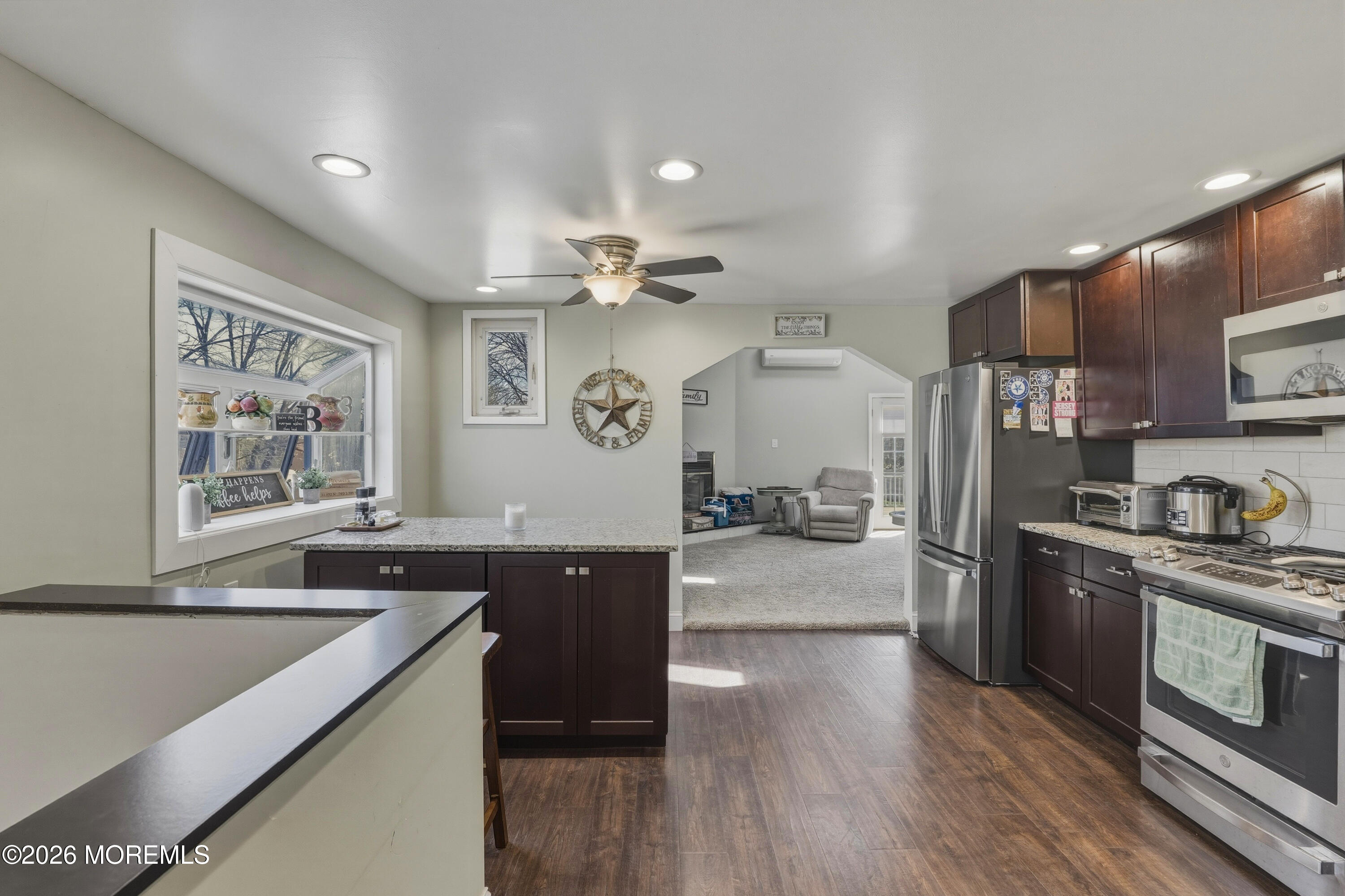 578 High Street Long Branch, NJ 07740 - Photo 6 of 37 a large kitchen with stainless steel appliances granite countertop a lot of counter space and wooden floors