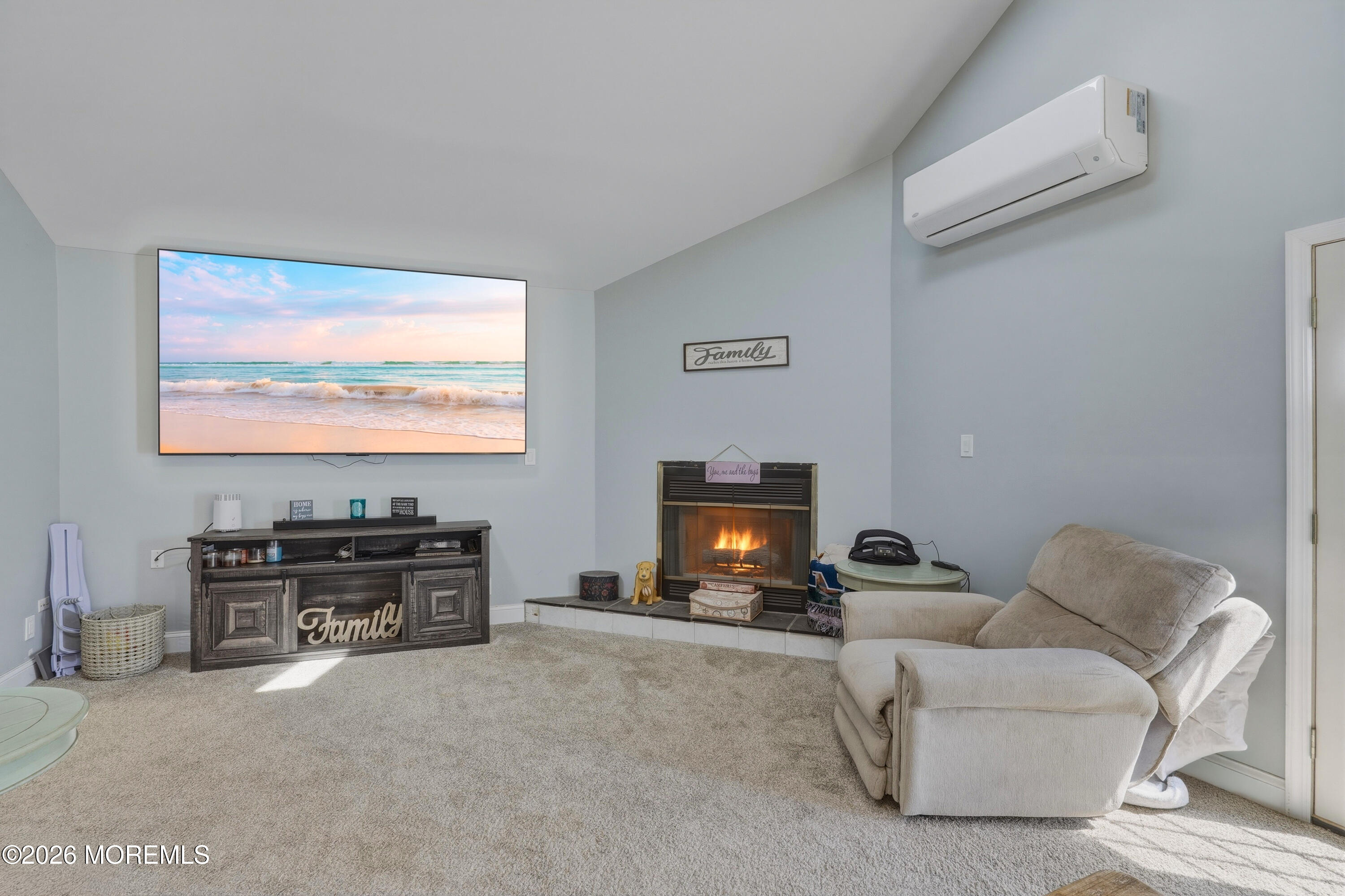578 High Street Long Branch, NJ 07740 - Photo 9 of 37 a living room with furniture and a flat screen tv