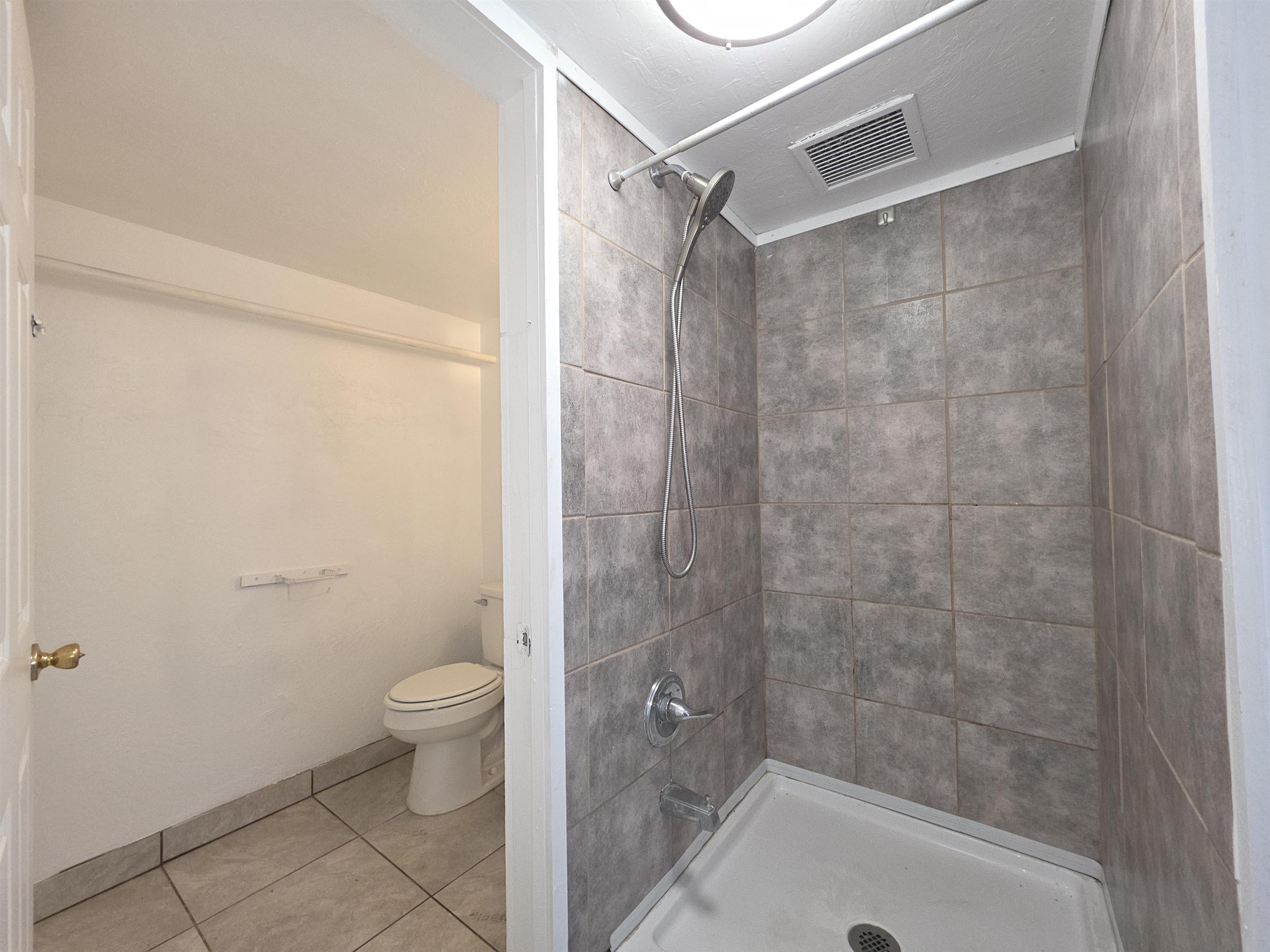 111 Kahului Beach Road, Unit B306 Kahului, HI 96732 - Photo 14 of 29 a bathroom with a shower and a toilet