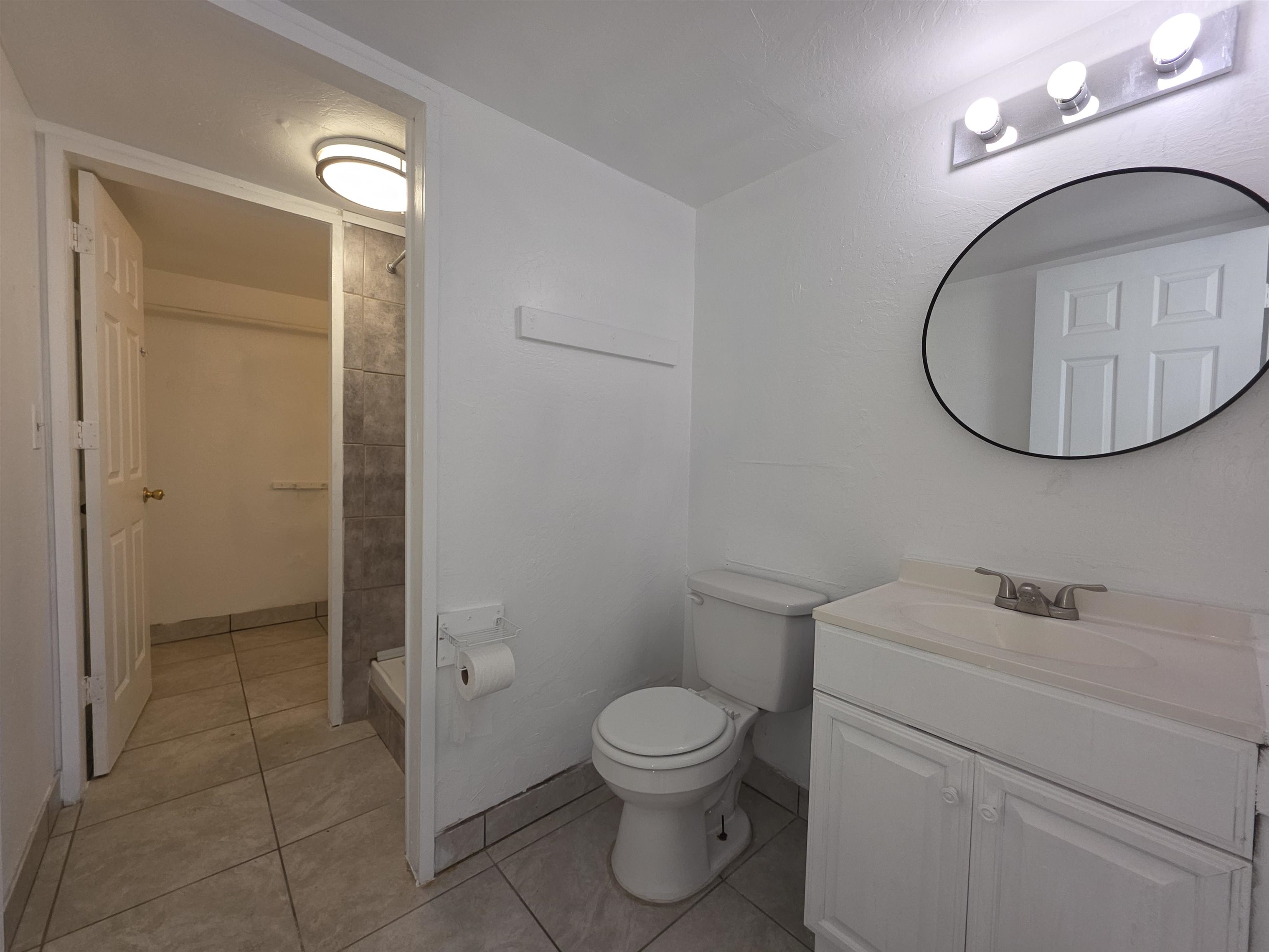 111 Kahului Beach Road, Unit B306 Kahului, HI 96732 - Photo 15 of 29 a bathroom with a toilet a sink and a mirror