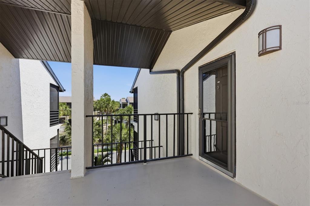 2729 North Beach Road, Unit 211 Englewood, FL 34223 - Photo 10 of 51 a view of a porch