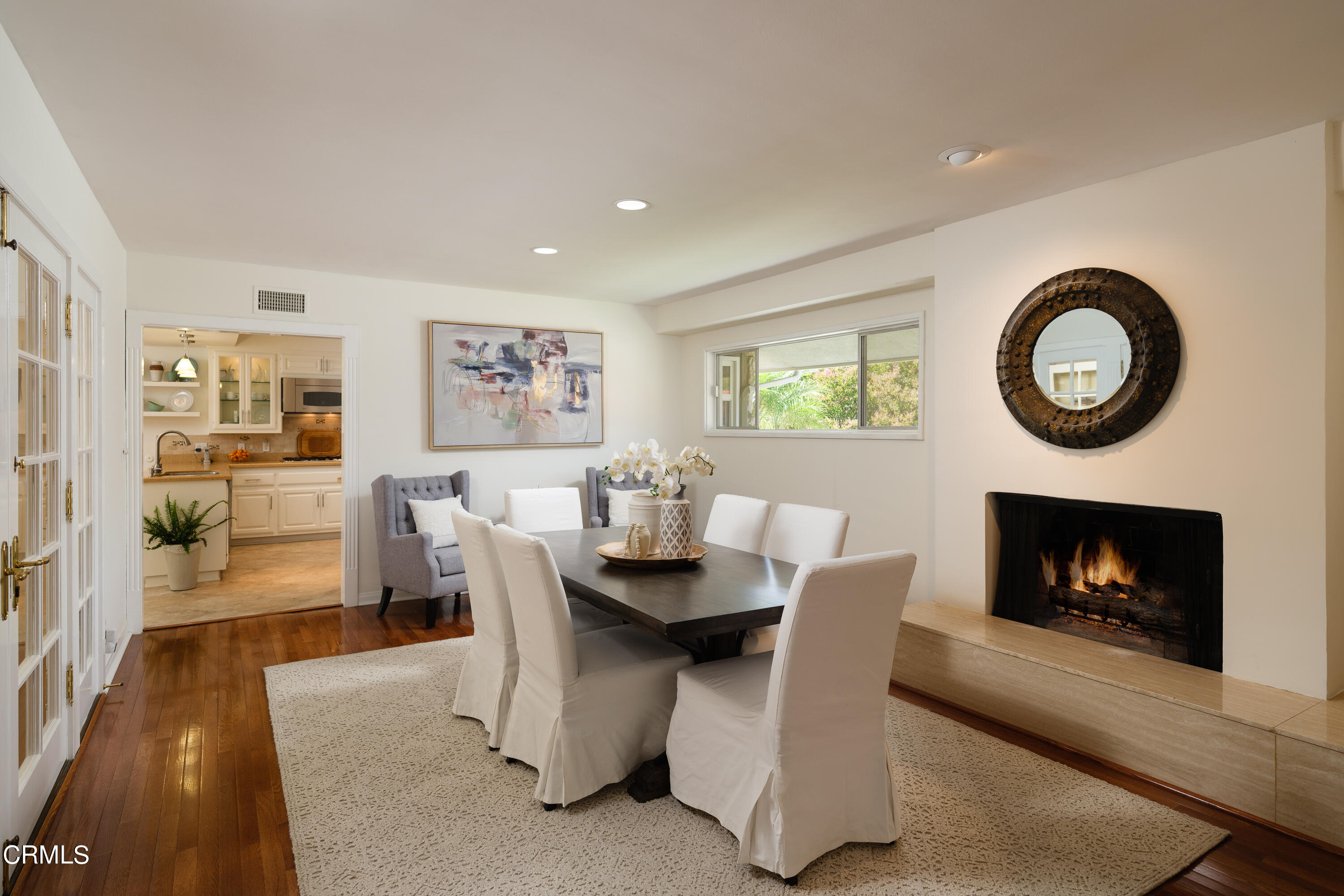 1450 Pegfair Estates Drive Pasadena, CA 91103 - Photo 12 of 58 a dining room with furniture and a fireplace