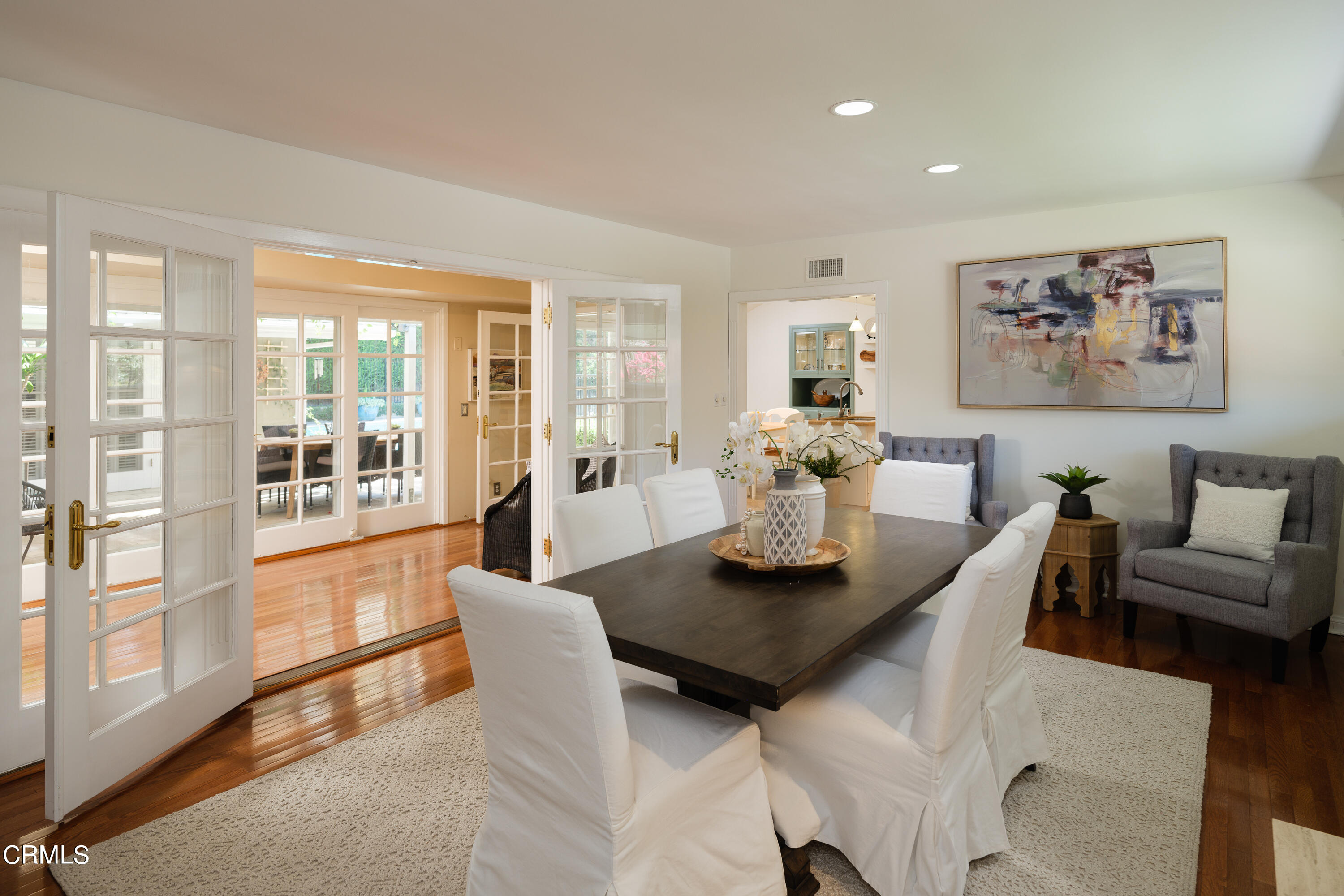 1450 Pegfair Estates Drive Pasadena, CA 91103 - Photo 15 of 58 a view of a dining room with furniture and a large window