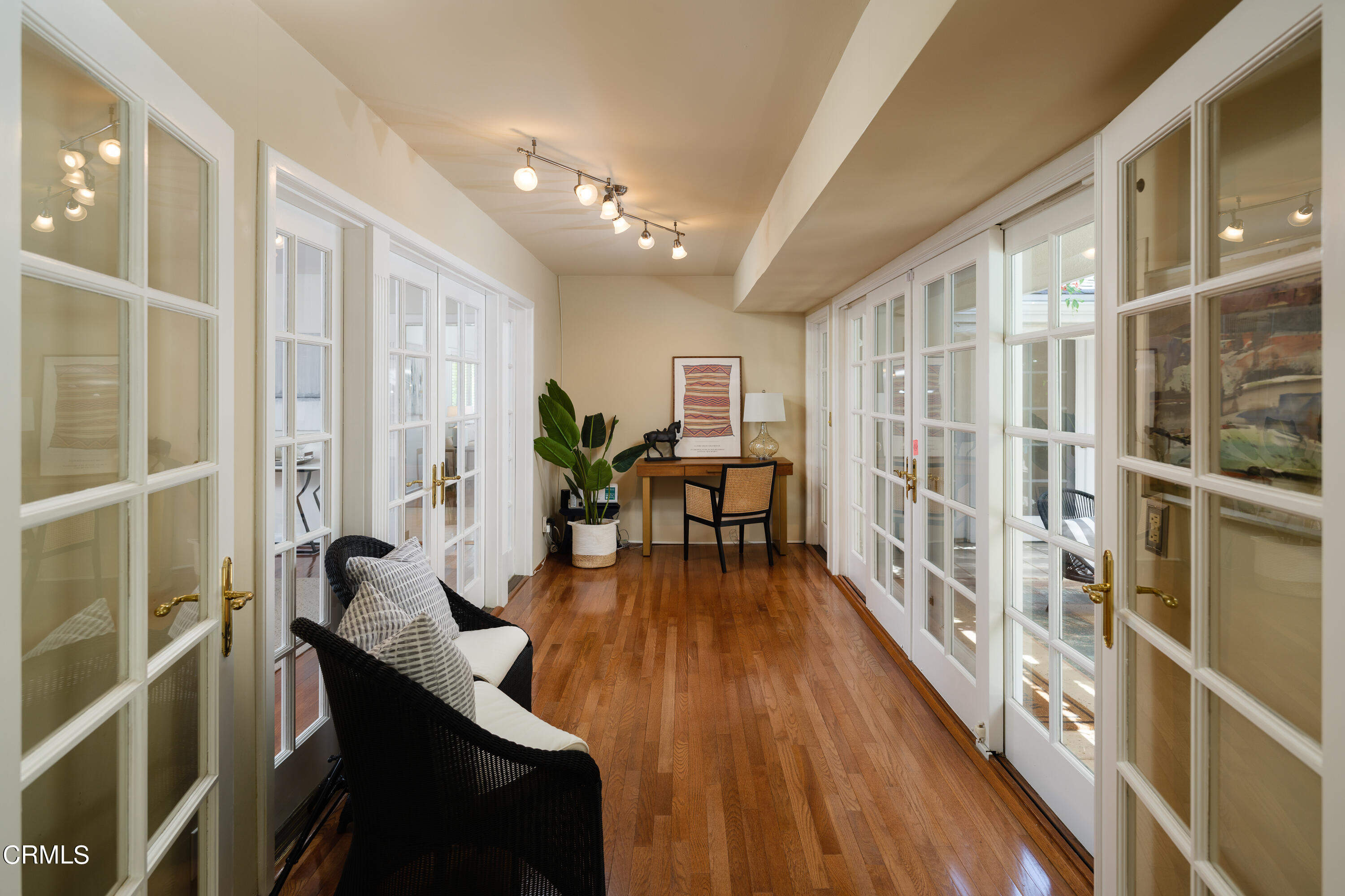 1450 Pegfair Estates Drive Pasadena, CA 91103 - Photo 16 of 58 a view of a dining room with furniture and wooden floor