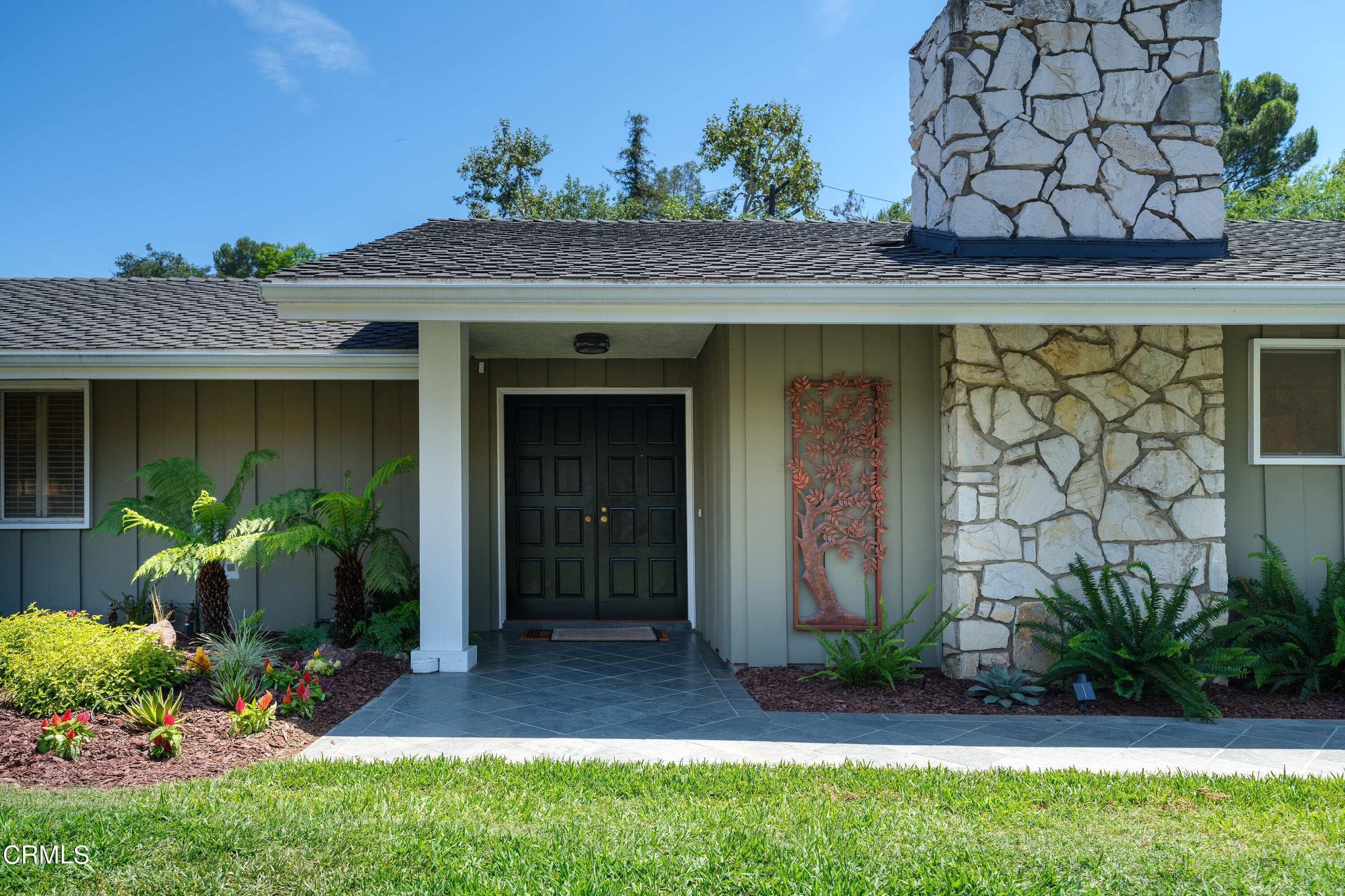 1450 Pegfair Estates Drive Pasadena, CA 91103 - Photo 2 of 58 a front view of a house with garden