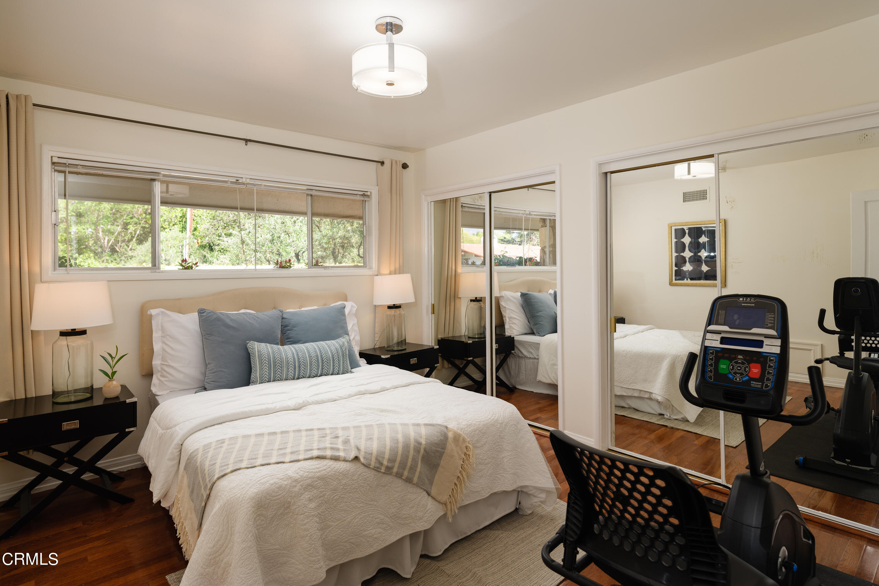 1450 Pegfair Estates Drive Pasadena, CA 91103 - Photo 30 of 58 a bedroom with a bed and wooden floor