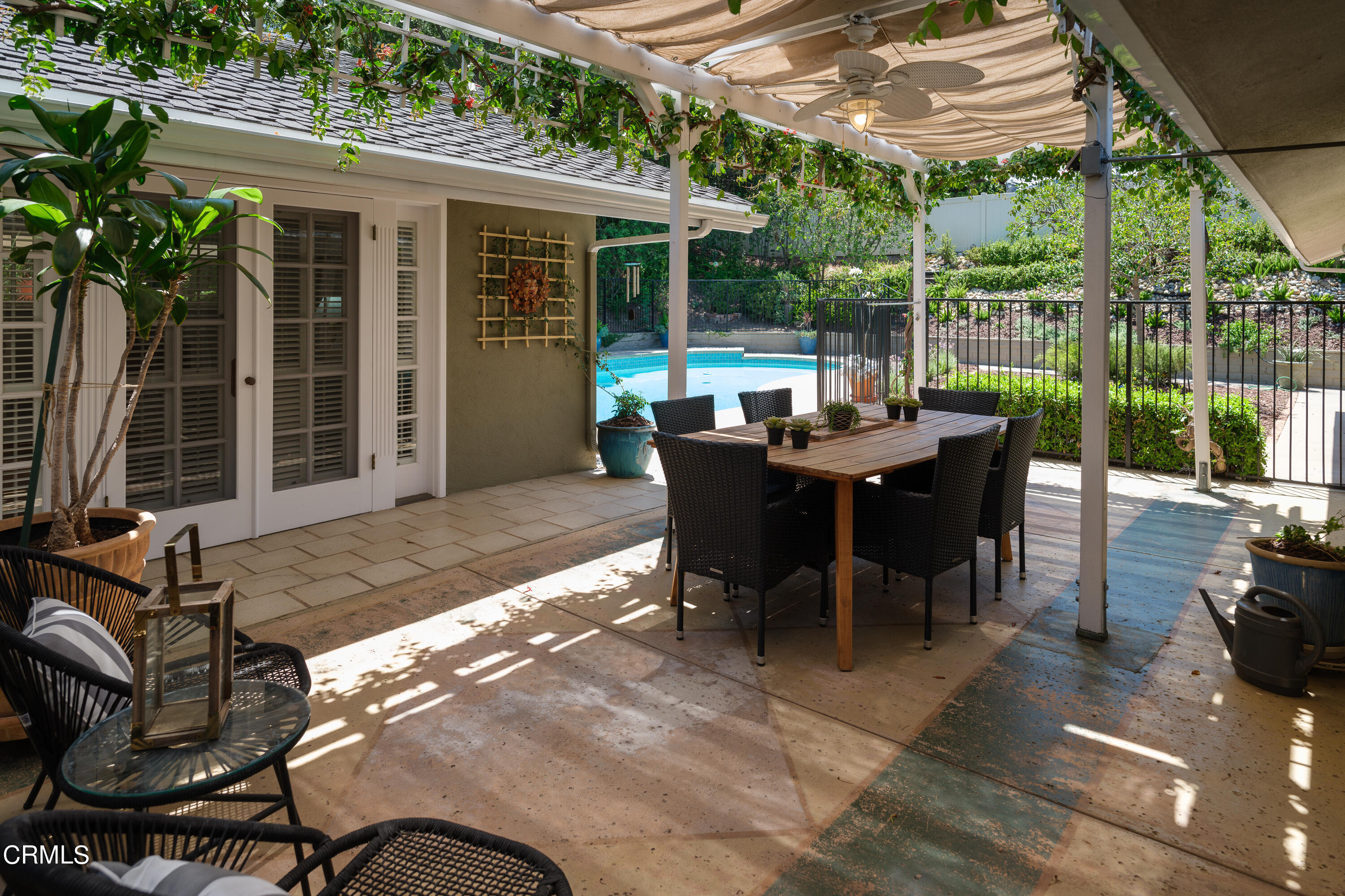 1450 Pegfair Estates Drive Pasadena, CA 91103 - Photo 41 of 58 a view of a patio with a dining table and chairs