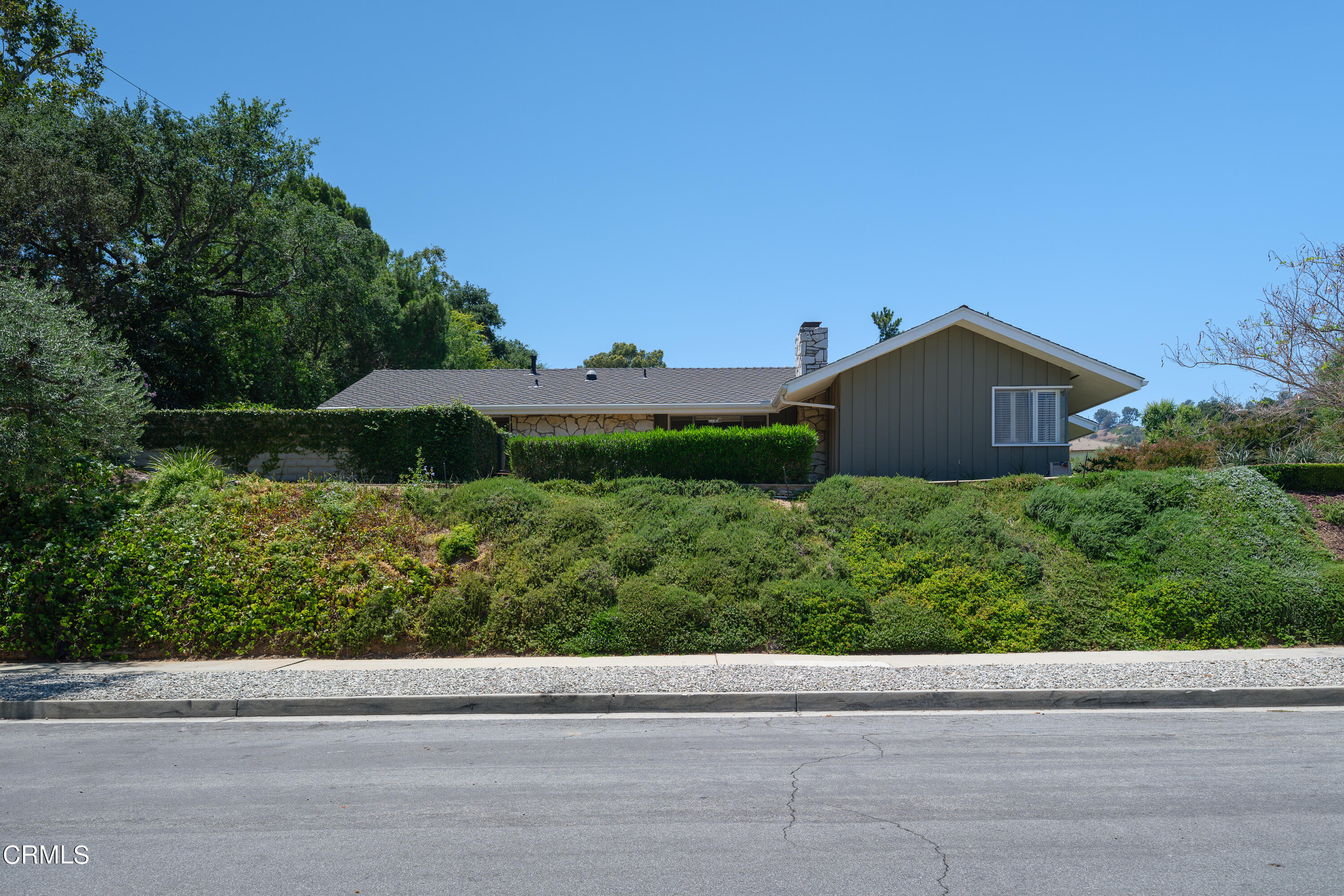 1450 Pegfair Estates Drive Pasadena, CA 91103 - Photo 55 of 58 a view of a house with a yard