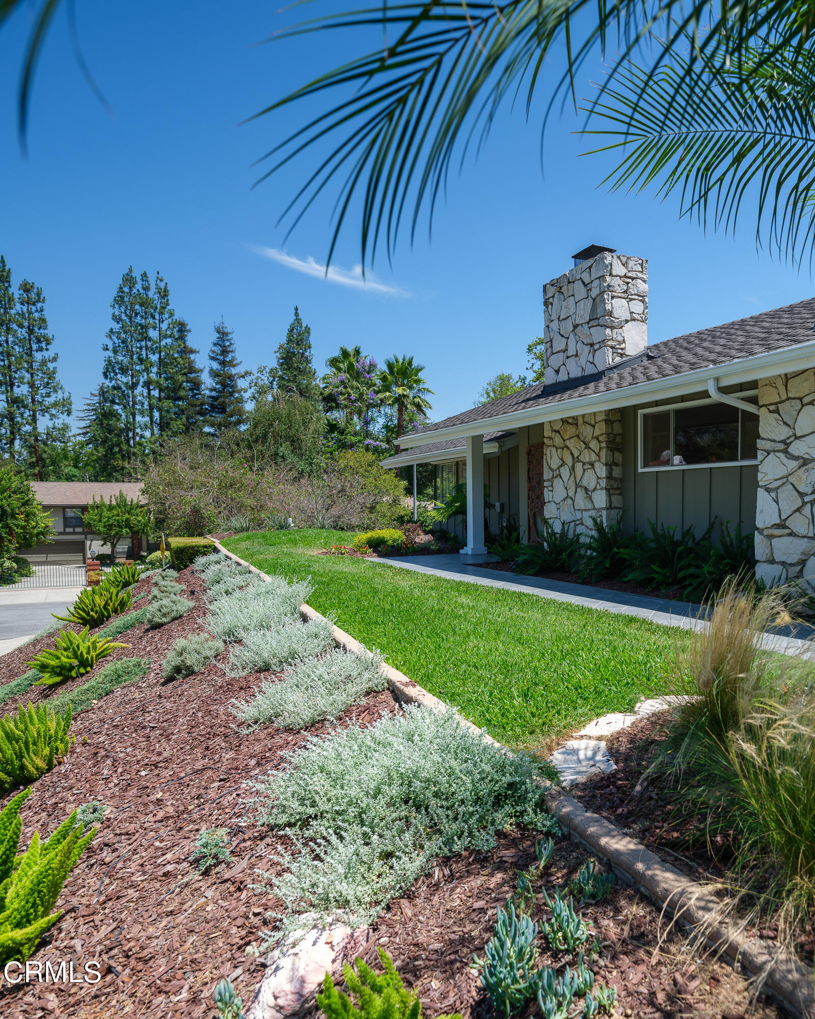 1450 Pegfair Estates Drive Pasadena, CA 91103 - Photo 57 of 58 a view of a house with a yard