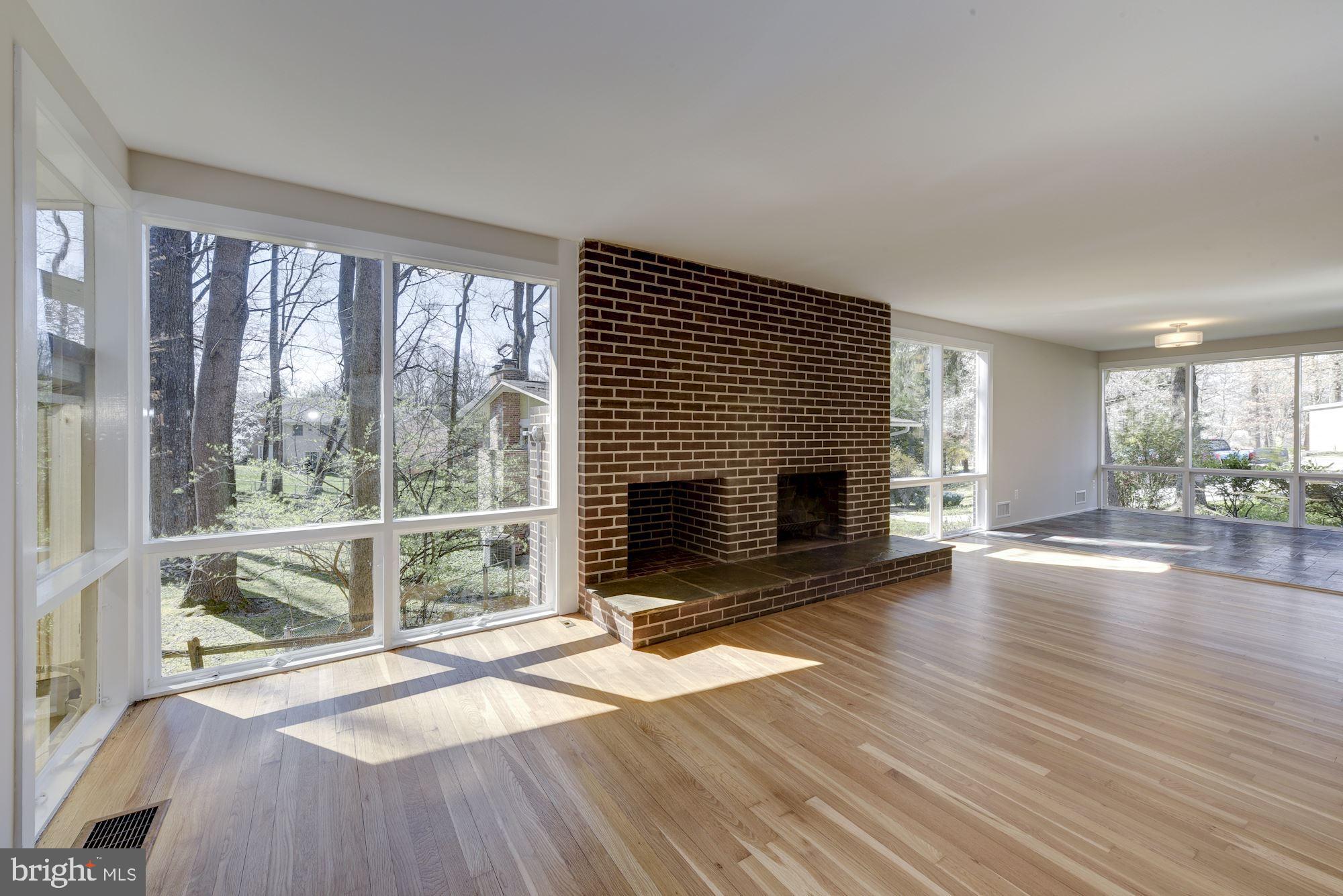 3700 Spruell Drive Silver Spring, MD 20902 - Photo 6 of 24 Refinished hardwood floors in living room