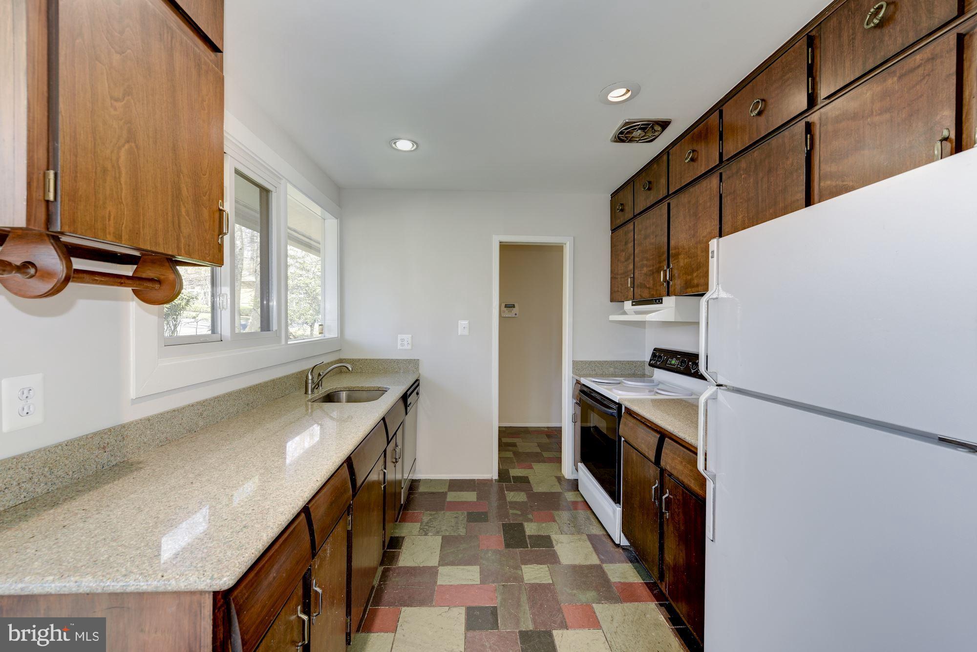 3700 Spruell Drive Silver Spring, MD 20902 - Photo 7 of 24 Kitchen with corian counters