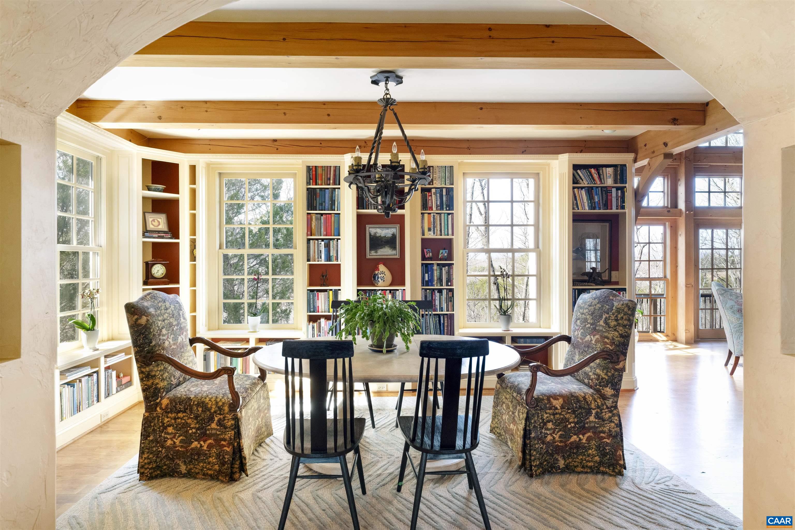 4414 Mt Alto Road Esmont, VA 22937 - Photo 16 of 68 a dining room with furniture window and wooden floor