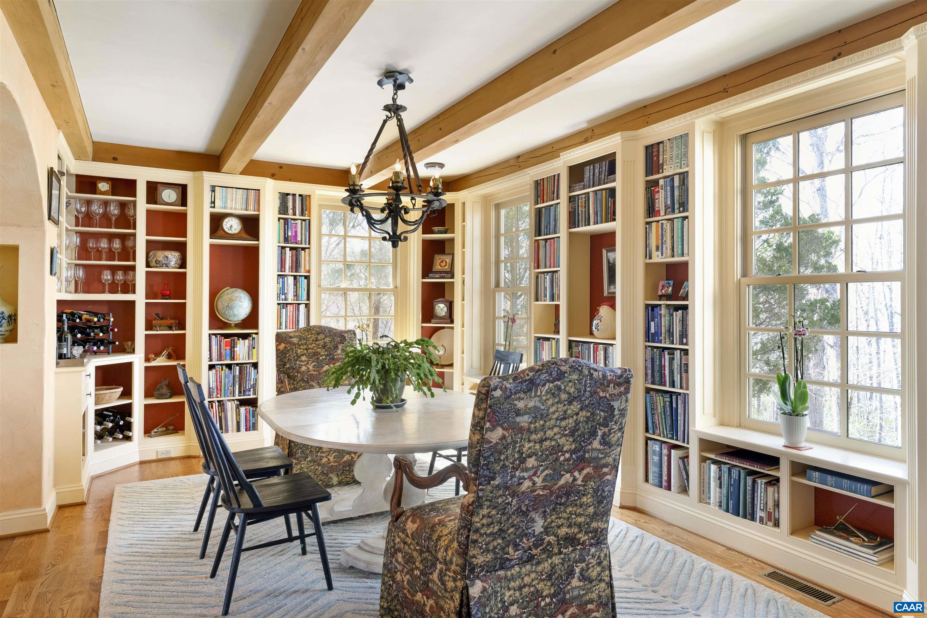 4414 Mt Alto Road Esmont, VA 22937 - Photo 17 of 68 a view of a dining room with furniture and chandelier