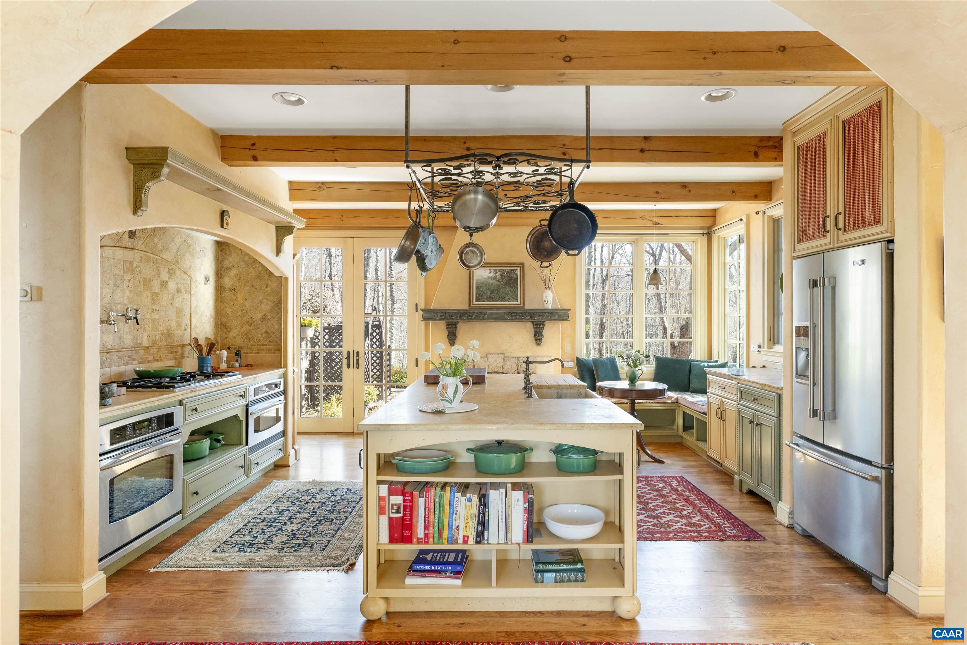 4414 Mt Alto Road Esmont, VA 22937 - Photo 18 of 68 a living room with stainless steel appliances kitchen island granite countertop a refrigerator a stove and a wooden cabinets