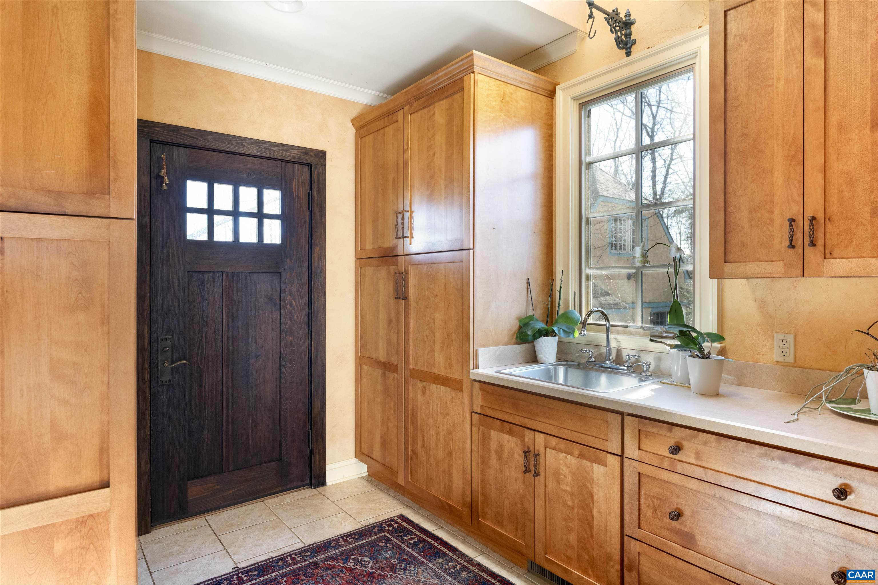 4414 Mt Alto Road Esmont, VA 22937 - Photo 24 of 68 a kitchen with stainless steel appliances granite countertop a refrigerator and a sink