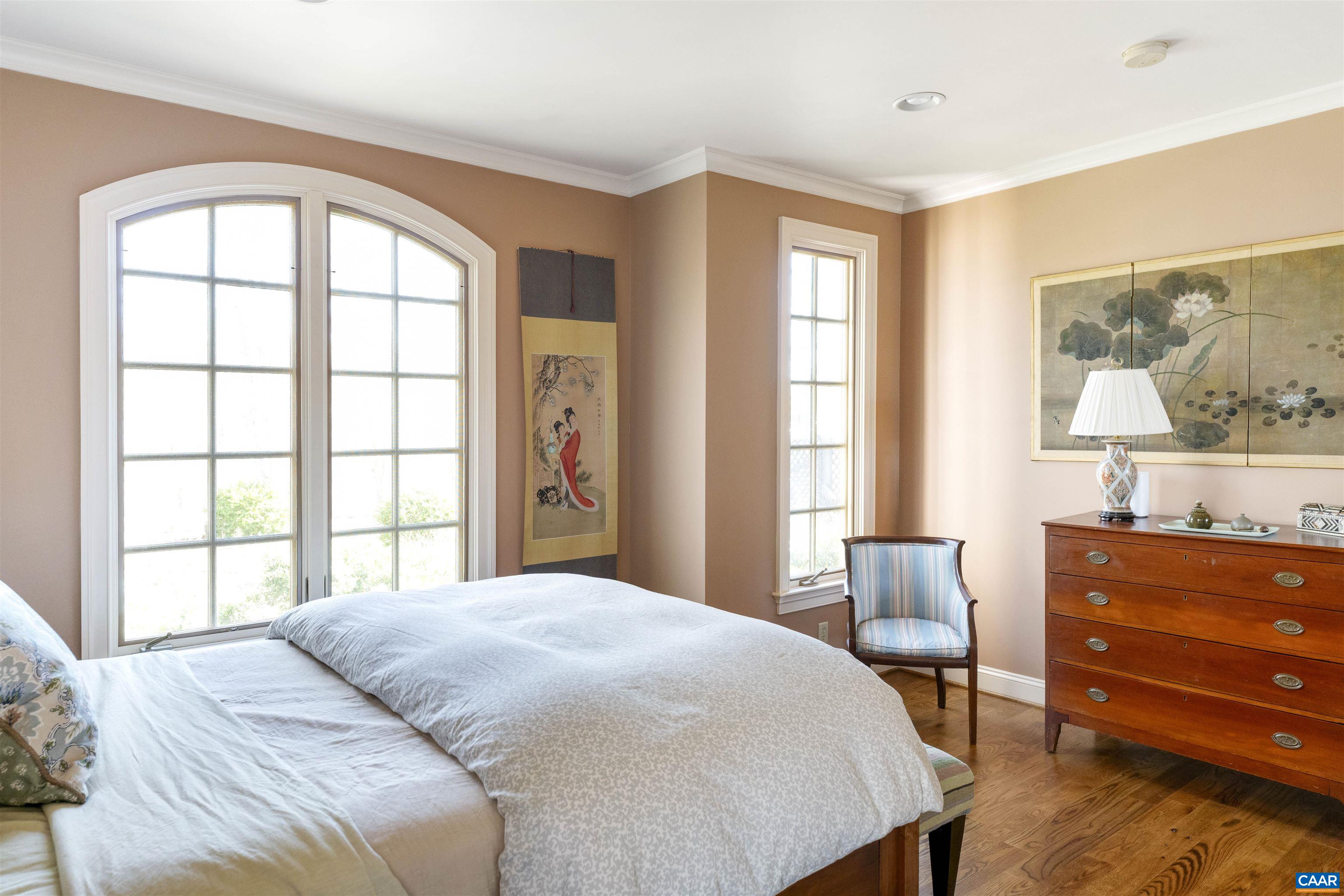 4414 Mt Alto Road Esmont, VA 22937 - Photo 28 of 68 a bedroom with a bed and a dresser next to a window