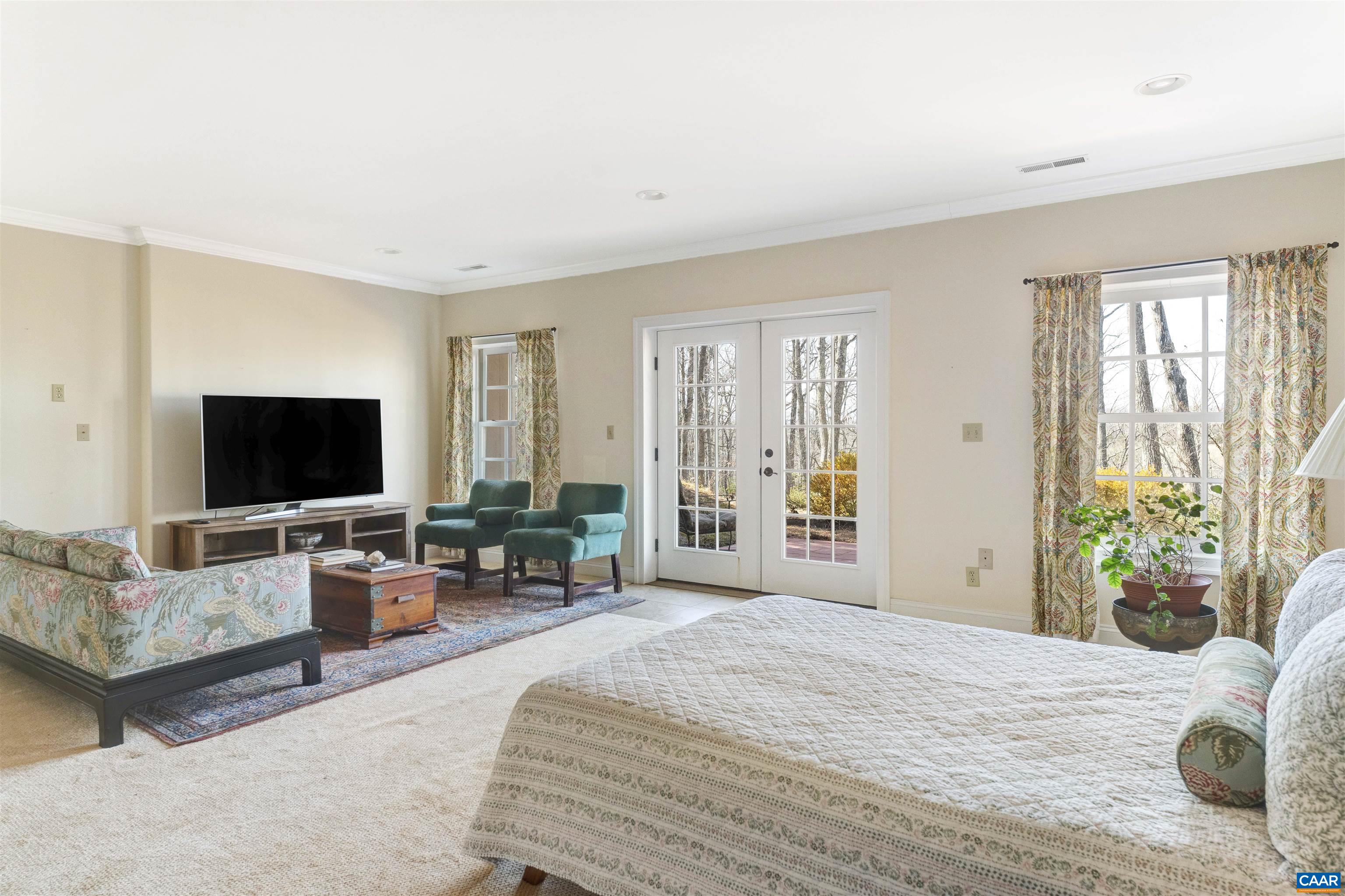 4414 Mt Alto Road Esmont, VA 22937 - Photo 38 of 68 a bedroom with furniture and a flat screen tv