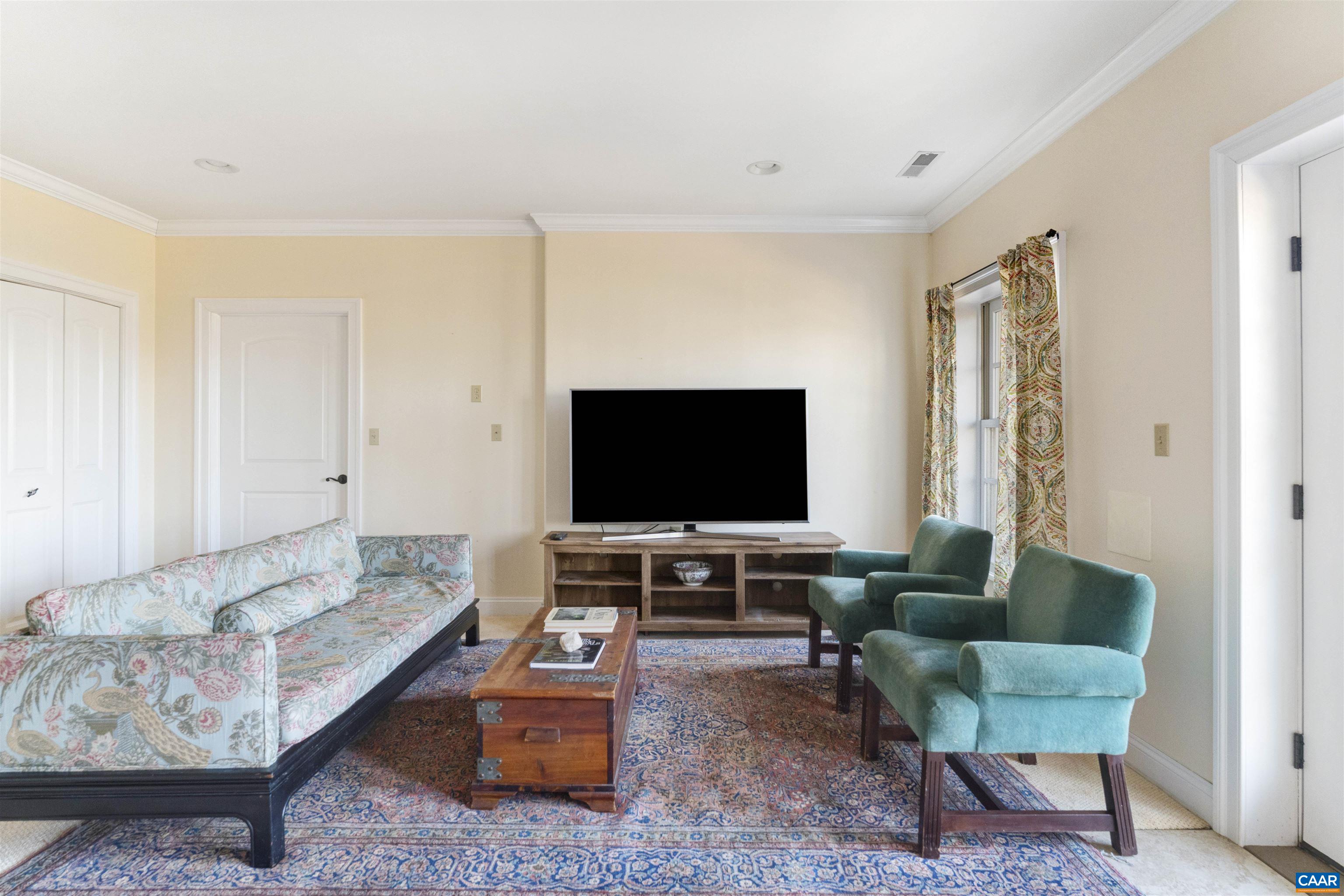 4414 Mt Alto Road Esmont, VA 22937 - Photo 39 of 68 a living room with furniture and a flat screen tv
