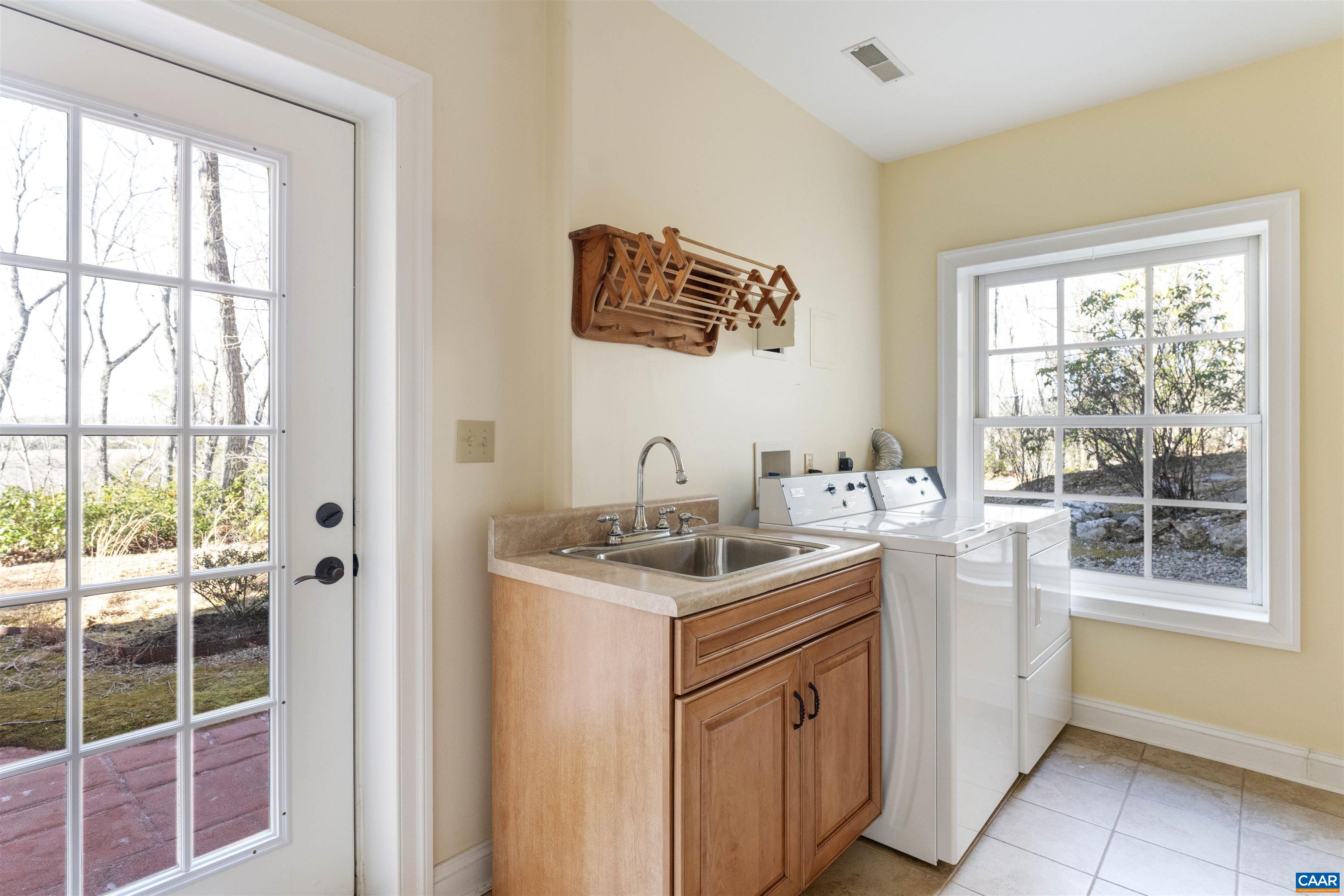 4414 Mt Alto Road Esmont, VA 22937 - Photo 40 of 68 a kitchen with a sink and a window
