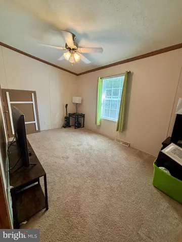 a view of a livingroom with furniture