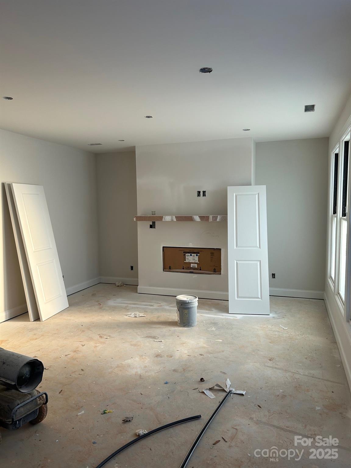 3040 Five Creek Road Charlotte, NC 28213 - Photo 4 of 11 a view of empty room with a fireplace