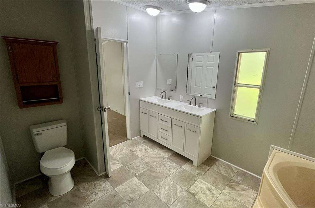 1458 Merridon Drive Pinnacle, NC 27043 - Photo 9 of 16 En Suite Bathroom