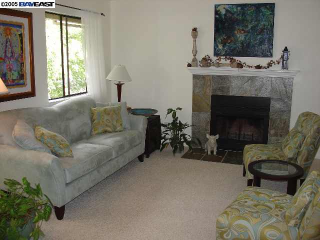 205 A Compton Circle San Ramon, CA 94583 - Photo 1 of 9 a living room with furniture and a fireplace