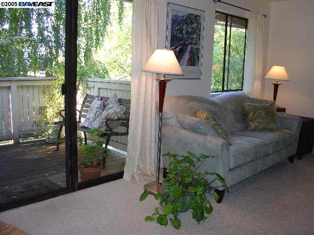 205 A Compton Circle San Ramon, CA 94583 - Photo 2 of 9 a living room with furniture and a yard