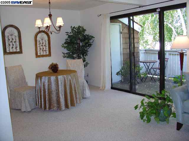 205 A Compton Circle San Ramon, CA 94583 - Photo 9 of 9 a view of a livingroom with furniture and garden