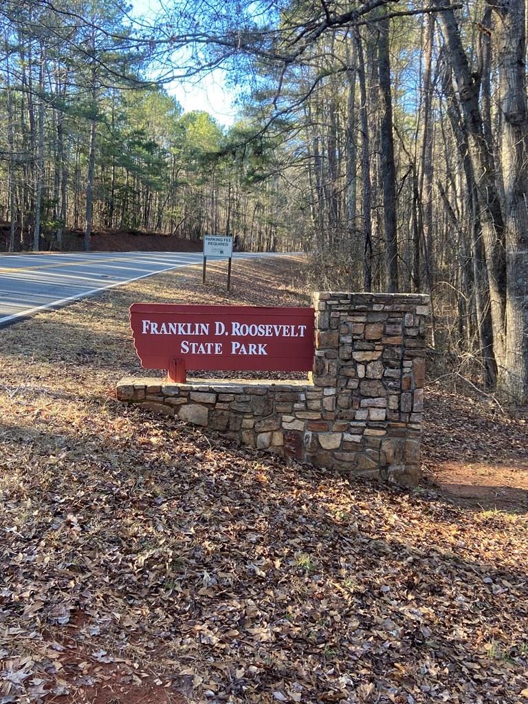 30 Elm Drive Hamilton, GA 31811 - Photo 3 of 3 a sign on the side of the road