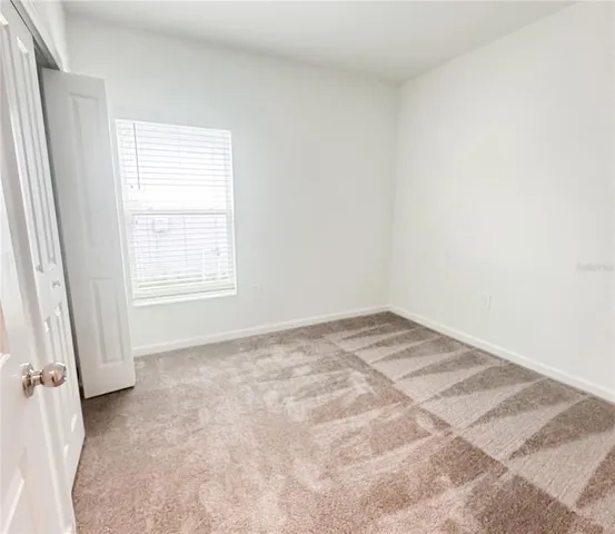 an empty room with a window