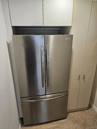 an empty room with wooden floor