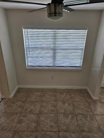 a view of a room that has a window in it